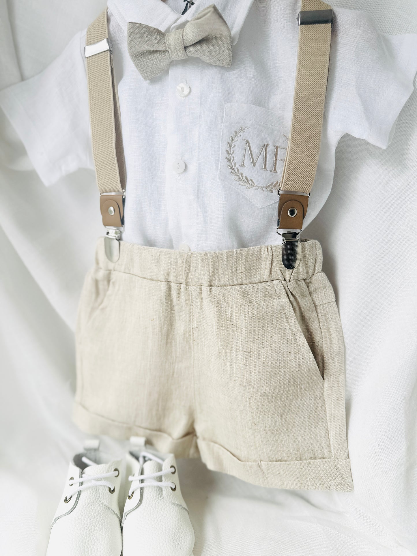 Beige Linen Baptism outfit with suspender shorts, shirt, and bow tie plus optional jacket and embroidery