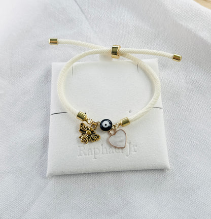 Evil eye bracelet white rope with gold clasps and optional charm