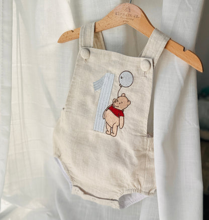 Boys Beige Linen First Birthday romper Pooh Bear and other designs
