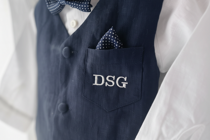 Beige linen suit with Navy blue vest