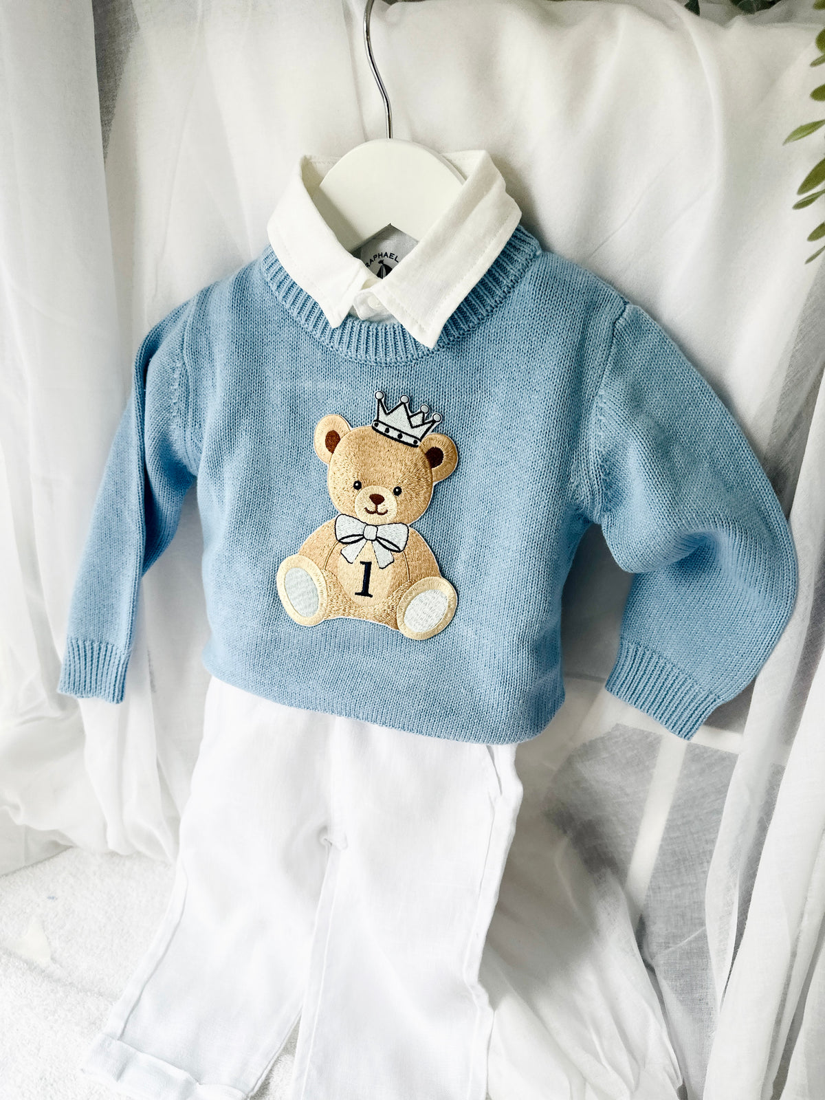 Pale blue teddy or hot air balloon jumper knit