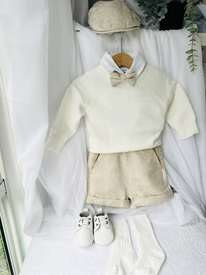 Beige Linen outfit with shorts, socks, shirt, and bow tie plus sweater