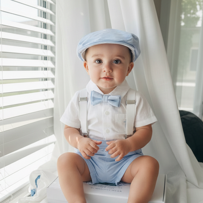 Boys pale blue shorts with linen shirt, blue suspenders and bow tie outfit plus optional extras