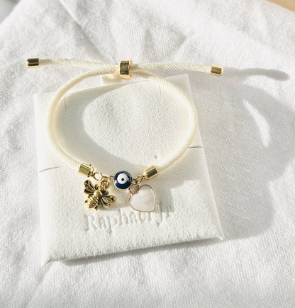 Evil eye bracelet white rope with gold clasps and optional charm