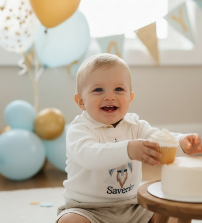 Birthday outfit with cotton onesie and embroidered jumper and linen pants
