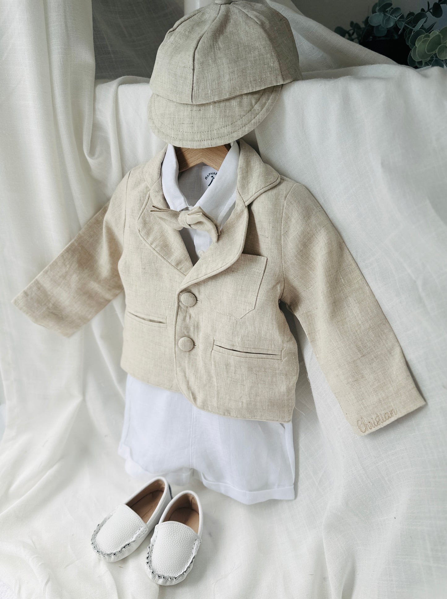 White and beige Summer linen outfit with suspender shorts, shirt, and bow tie plus optional jacket and embroidery