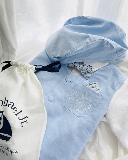 Pale blue summer vest set with blue vest, suspender shorts white shirt and bowtie