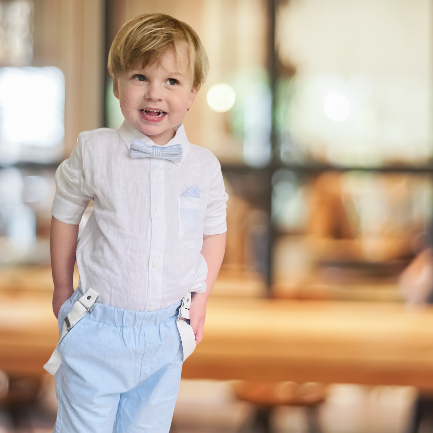 pale blue chambray summer first birthday set with shorts, shirt, suspenders and bow tie plus optional extras