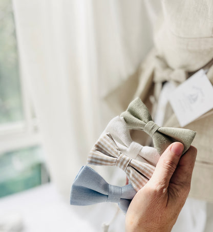Children's fabric bow ties in sage green, white, beige, blue and gingham cotton