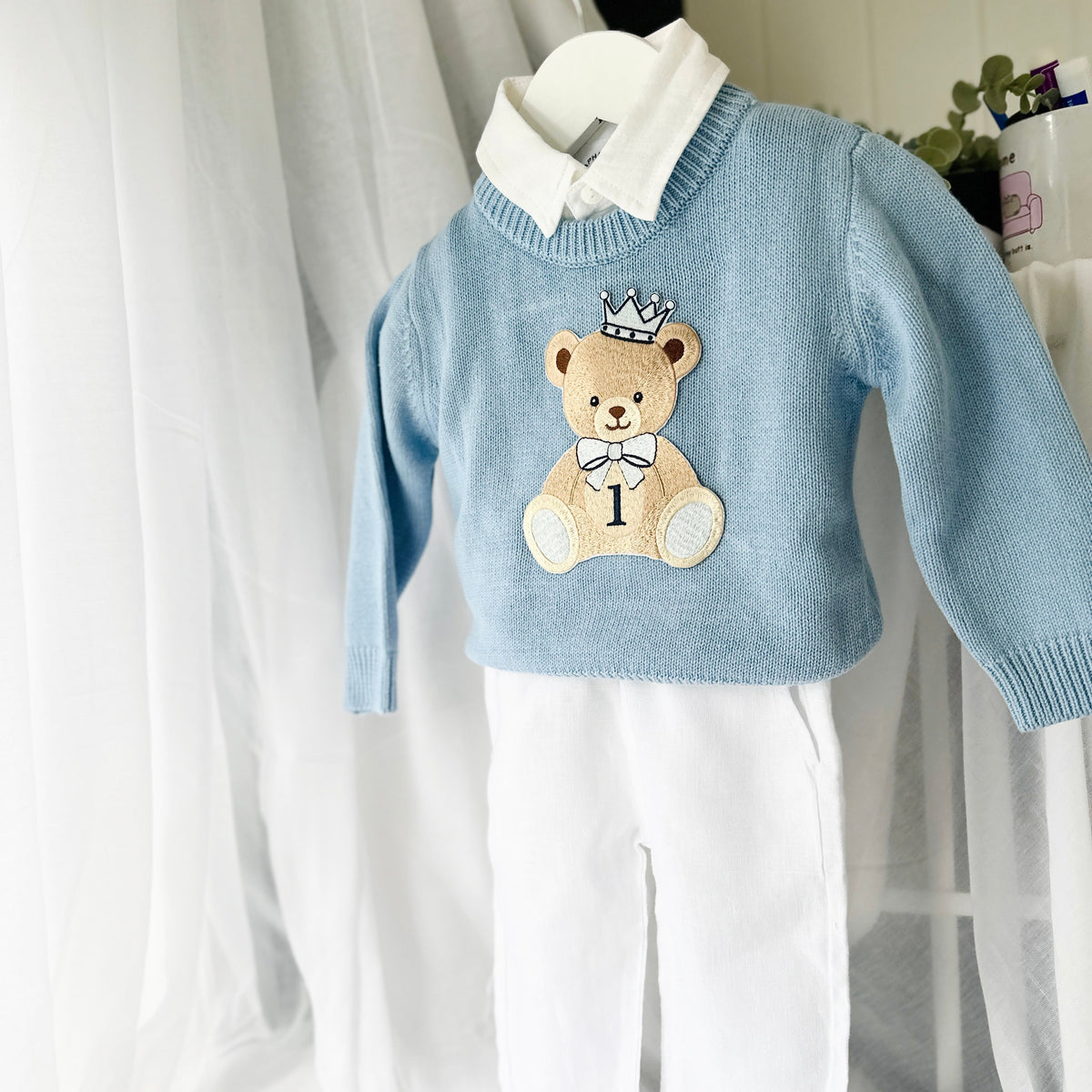 Pale blue teddy or hot air balloon jumper knit