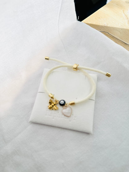 Evil eye bracelet white rope with gold clasps and optional charm