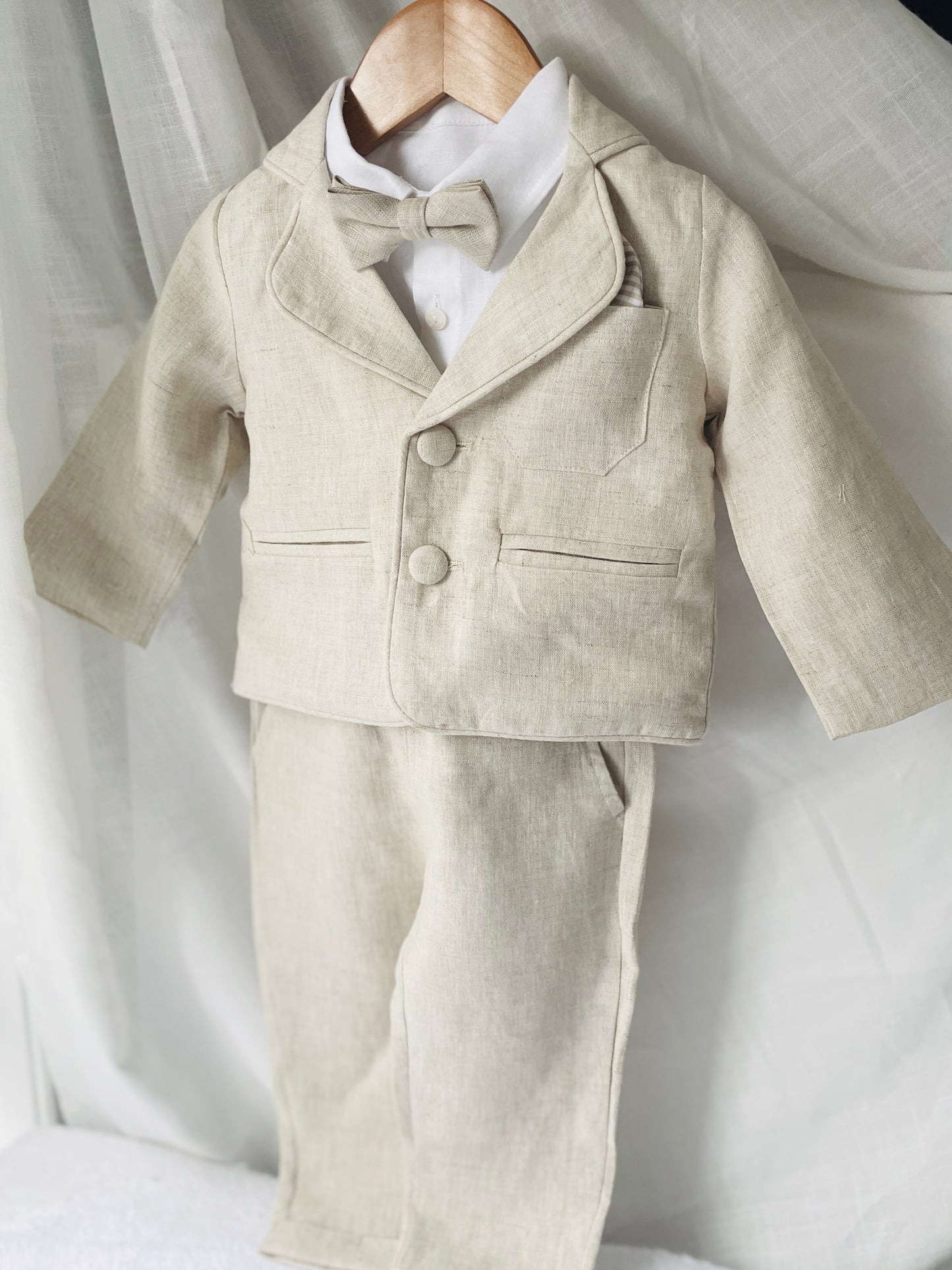 Beige linen suit with optional jacket, cap and shoes.