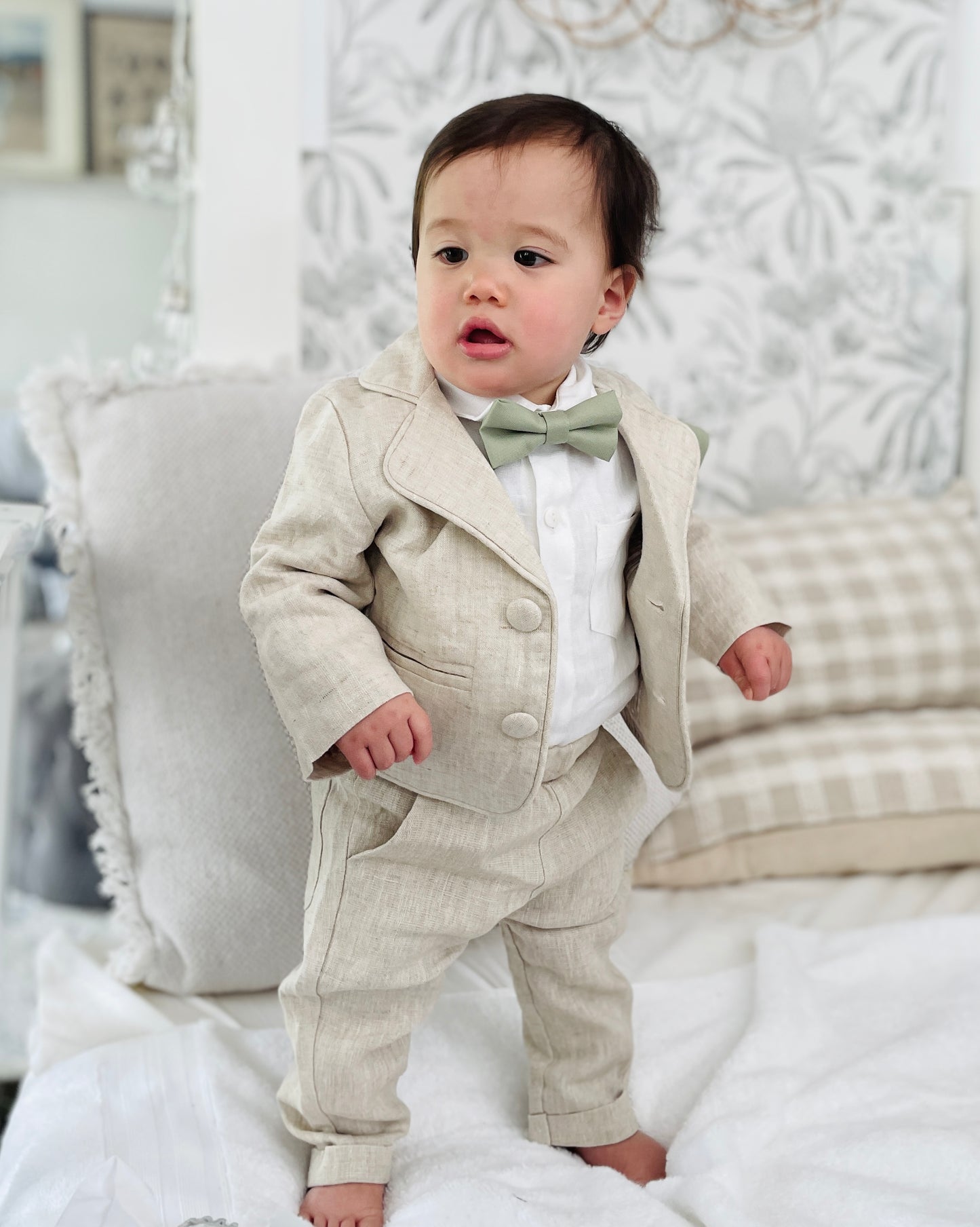 Beige linen suit with optional jacket, cap and shoes.