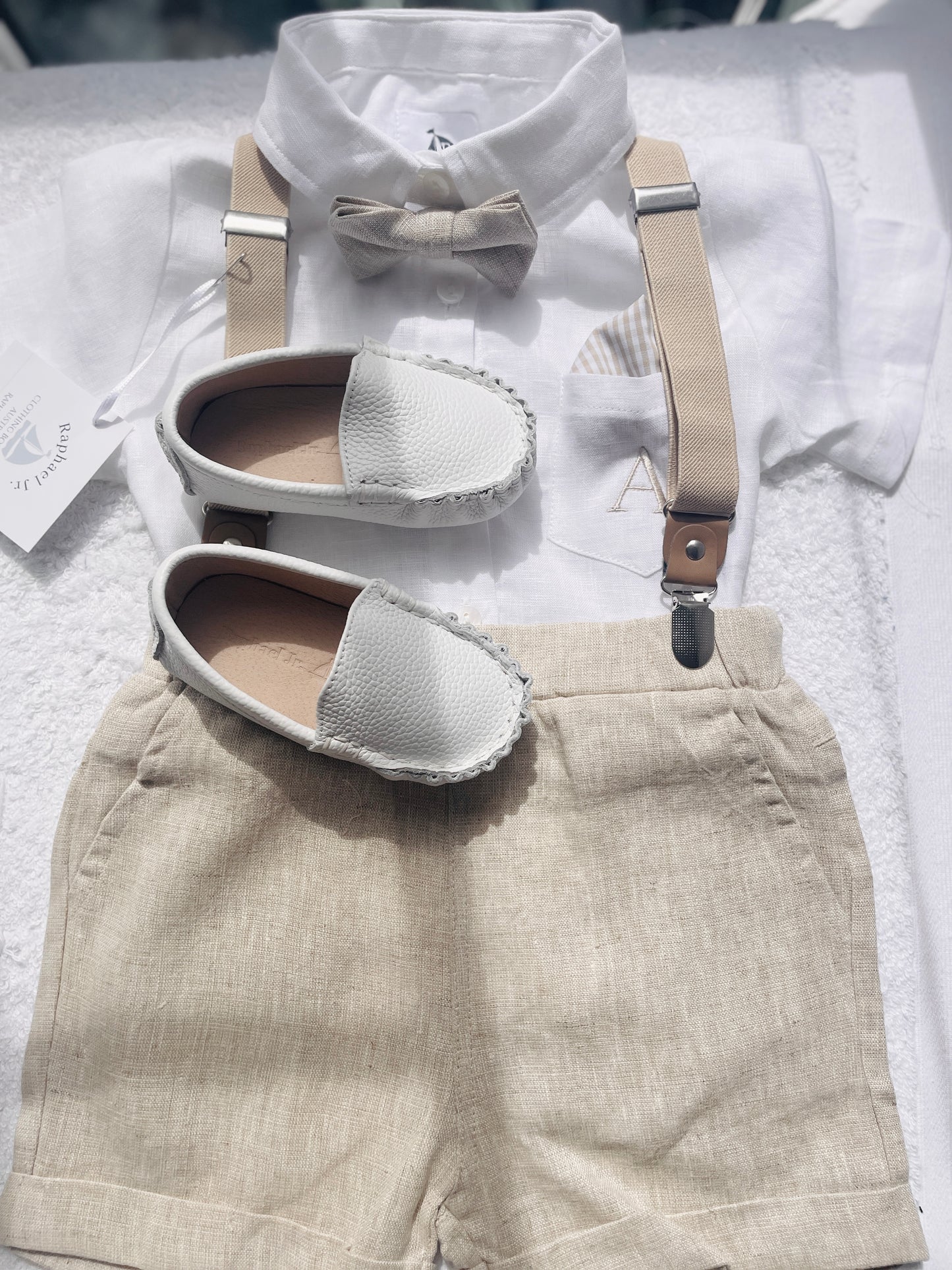 Beige Linen Baptism outfit with suspender shorts, shirt, and bow tie plus optional jacket and embroidery