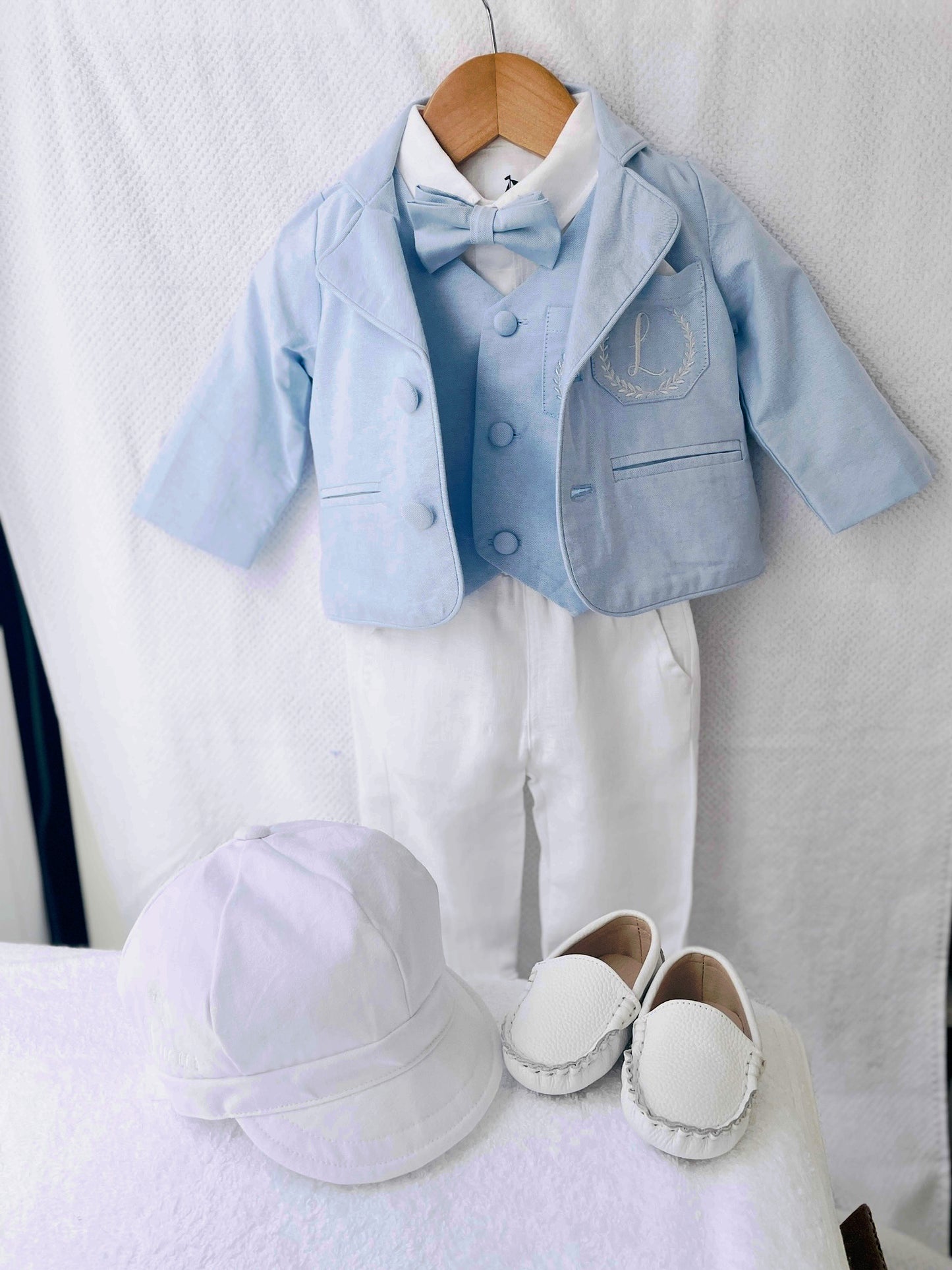 Boys pale blue and white Baptism outfit with blue vest, white linen suspender pants and shirt