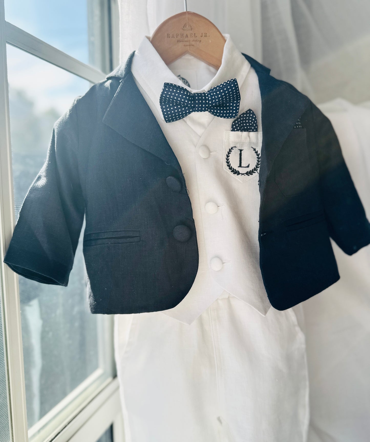 Boys white vest with white linen suit and navy jacket set