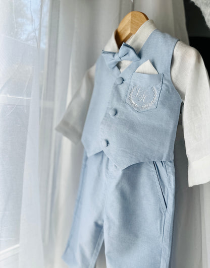 Pale blue summer vest set with blue vest, suspender shorts white shirt and bowtie