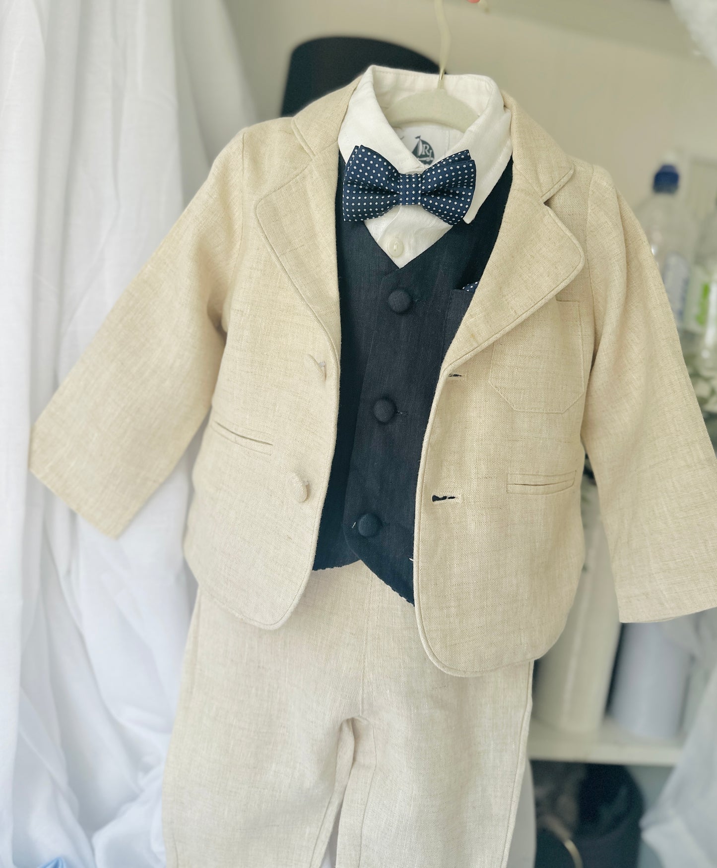 Beige linen suit with Navy blue vest