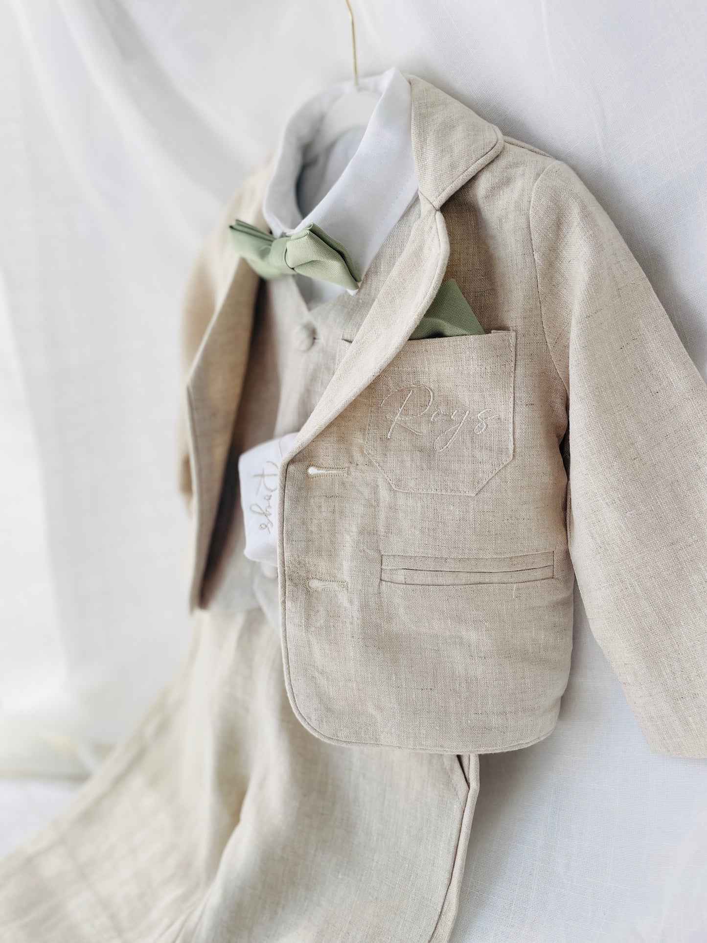 Beige linen set with vest, shirt, pants, suspenders and bowtie plus optional jacket, cap and shoes