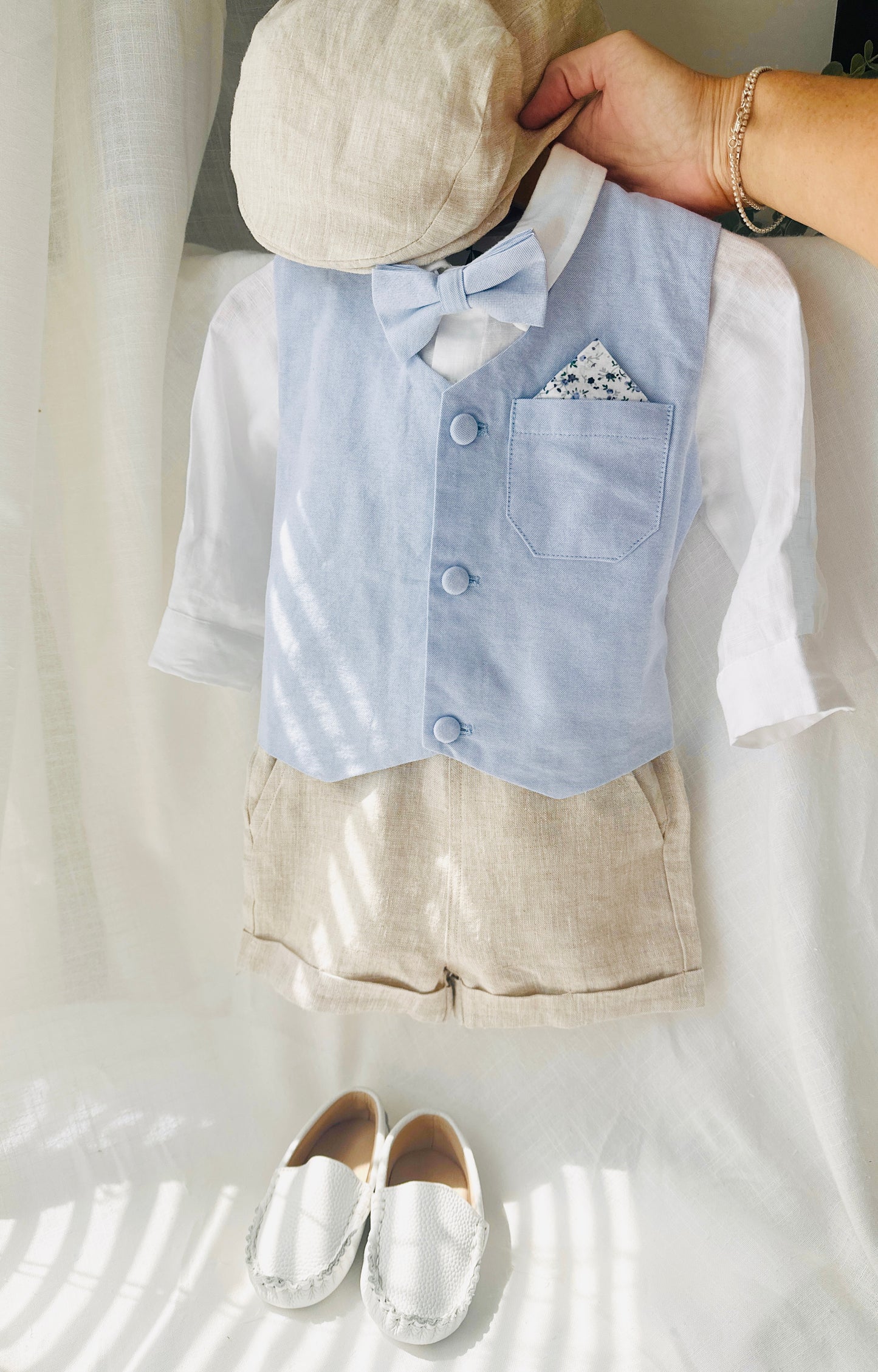 Pale blue and Beige linen summer set with blue vest, white shirt, beige shorts, suspenders and blue bow tie