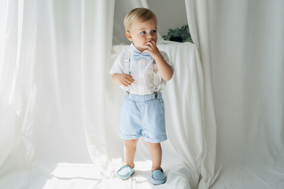 Boys pale blue shorts with linen shirt, blue suspenders and bow tie outfit plus optional extras