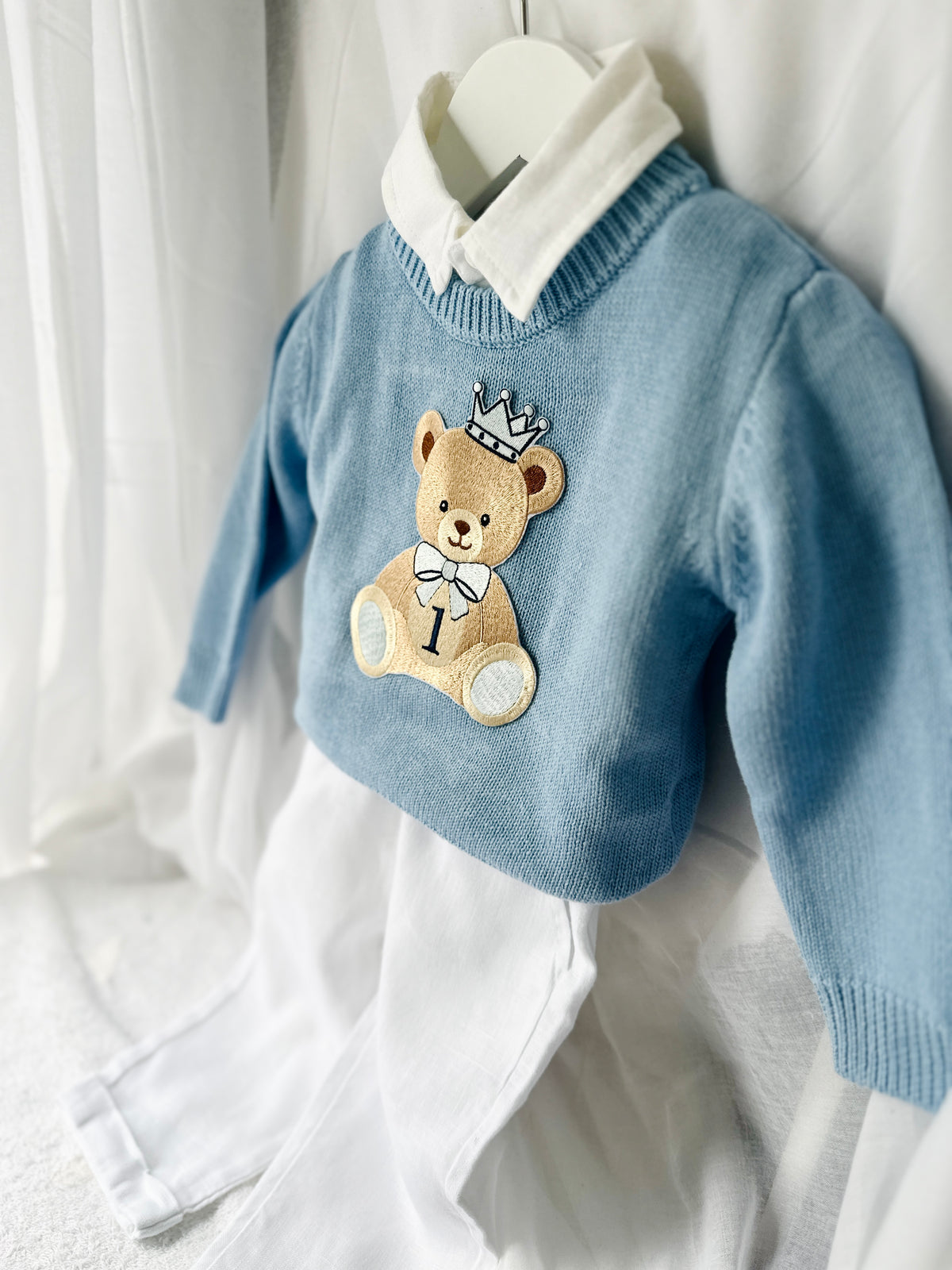 Pale blue teddy or hot air balloon jumper knit