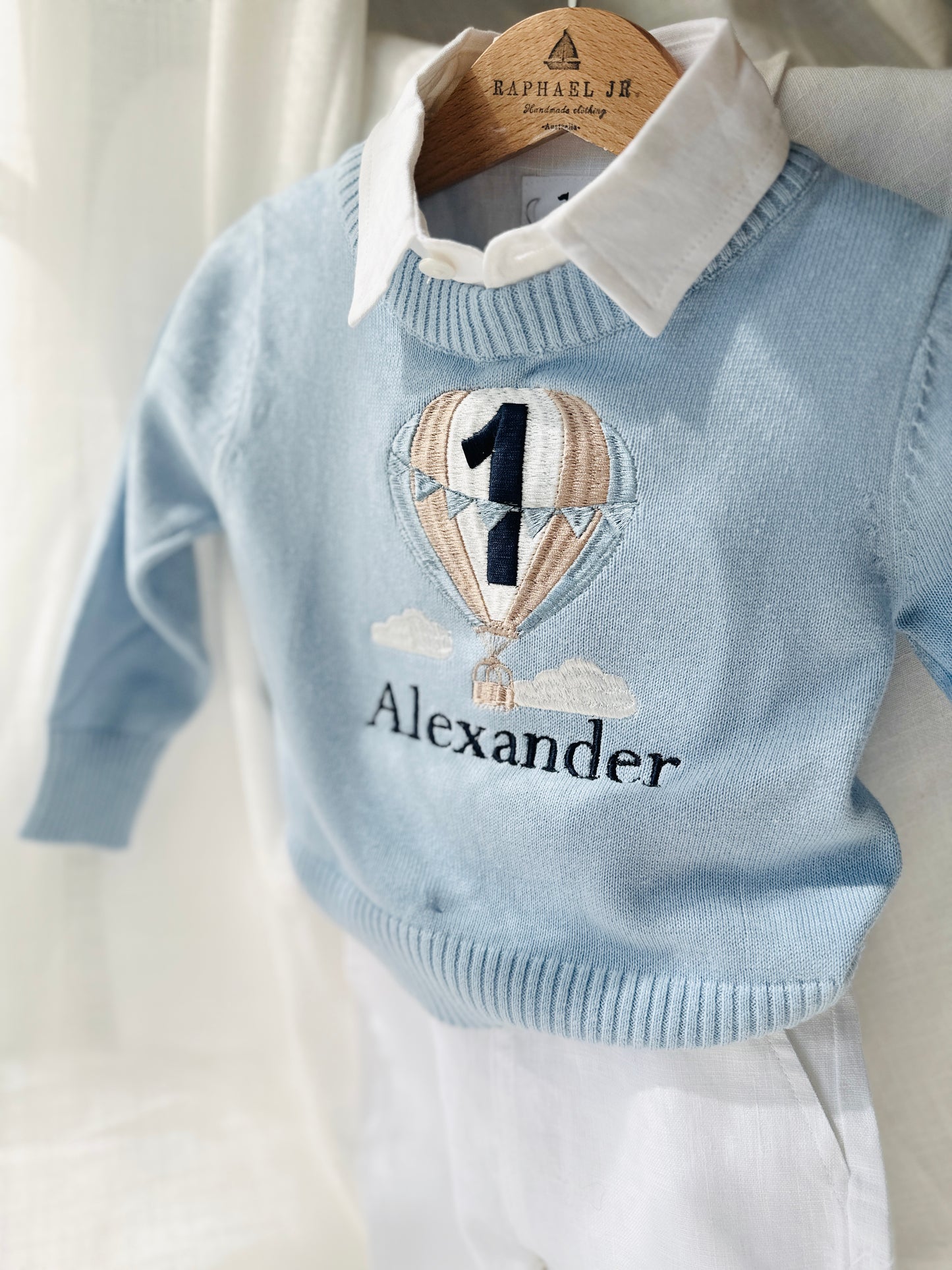 Baby blue cotton sweater with optional embroidery