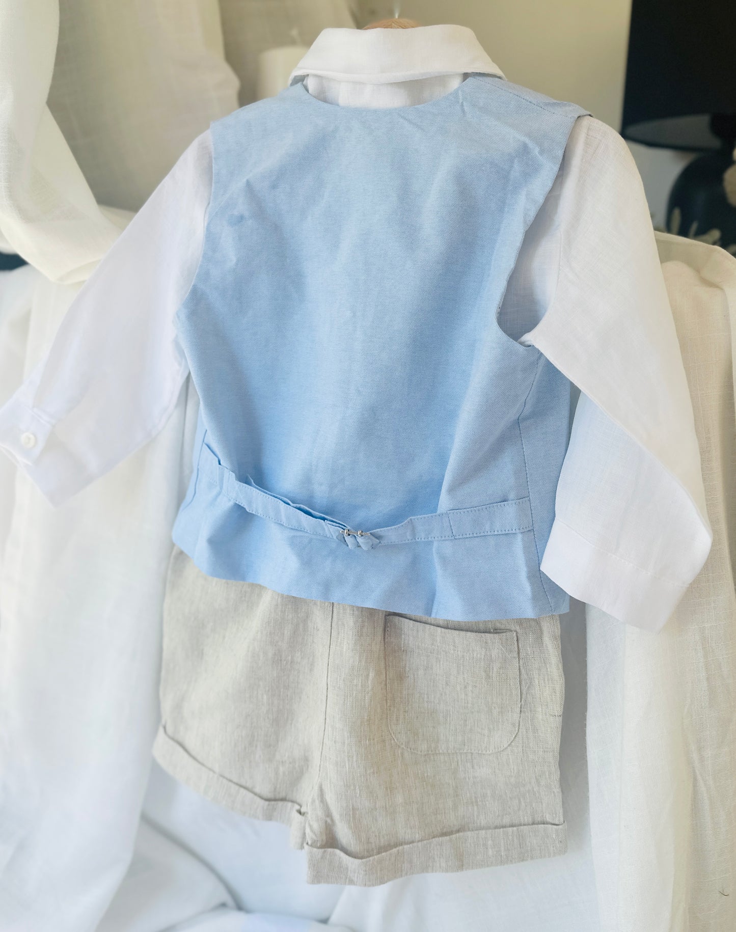 Beige Linen pants and blue vest outfit