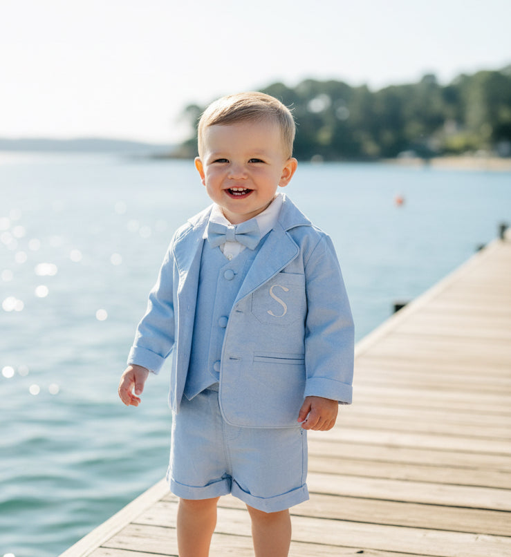 Pale blue summer vest set with blue vest, suspender shorts white shirt and blue blazer
