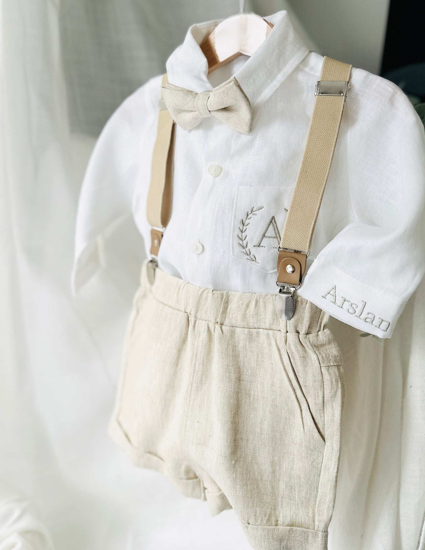 Beige Linen Baptism outfit with suspender shorts, shirt, and bow tie plus optional jacket and embroidery