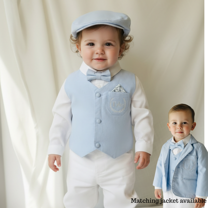 Pale blue vest suit with white pants and blue vest