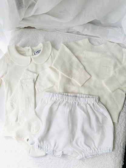 Baptism outfit with cotton onesie and cardigan or jumper and beige linen bloomers and white socks