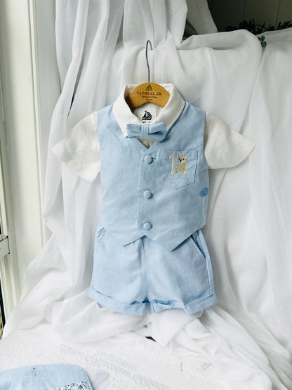 Pale blue summer vest set with blue vest, suspender shorts white shirt and bowtie