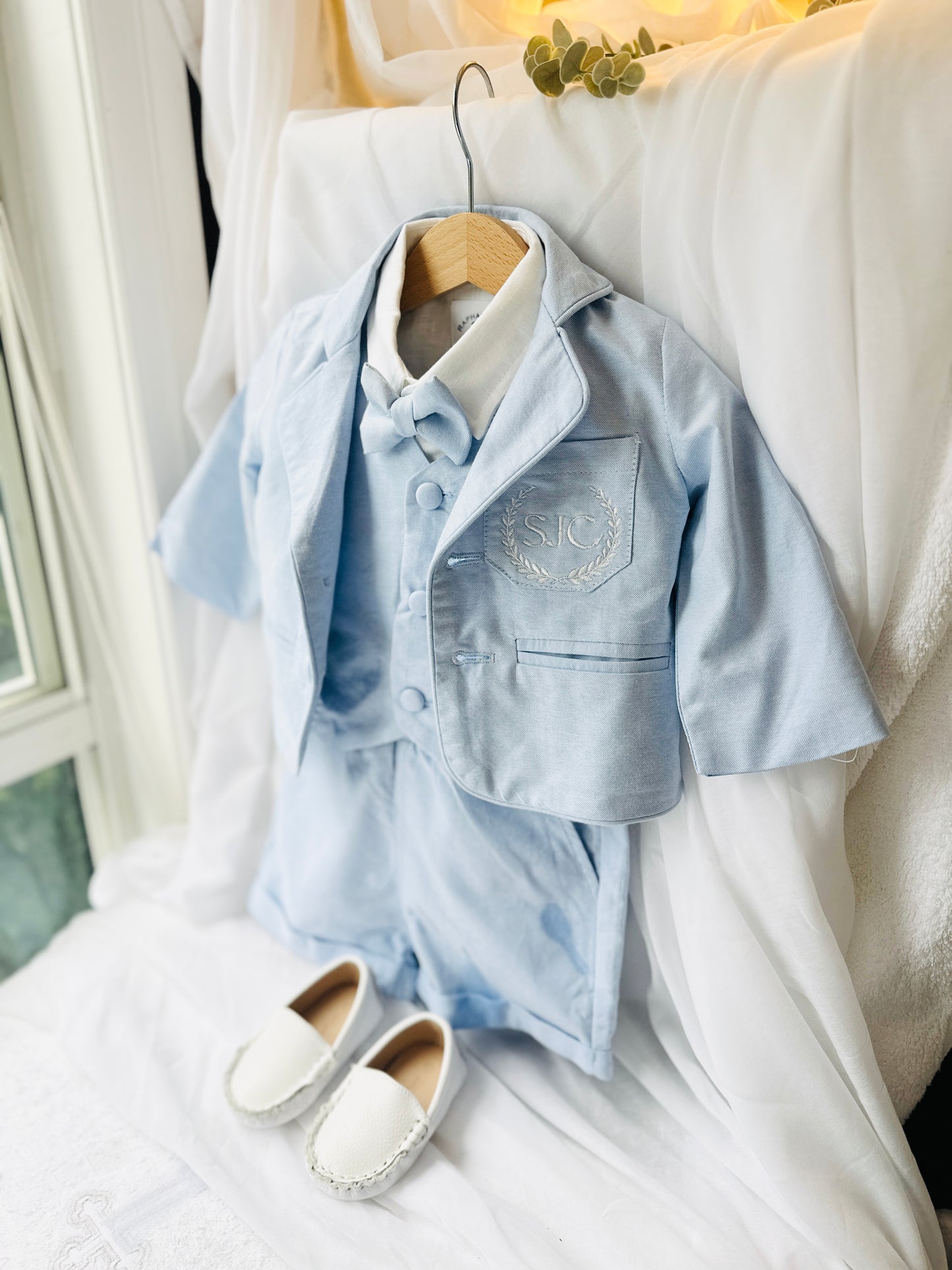 Pale blue summer vest set with blue vest, suspender shorts white shirt and blue blazer