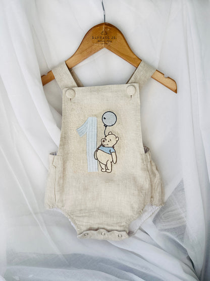 Boys Beige Linen First Birthday romper Pooh Bear and other designs