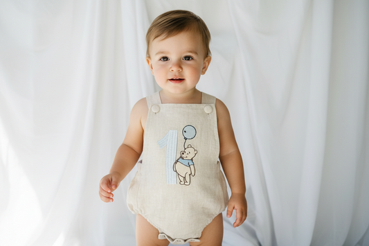 Boys Beige Linen First Birthday romper Pooh Bear and other designs