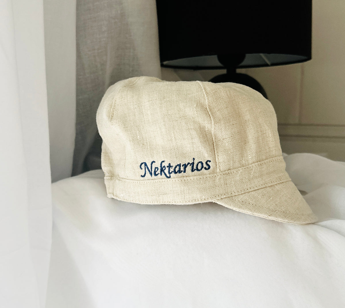 Beige linen paper boy cap for baptisms and christenings with optional embroidery