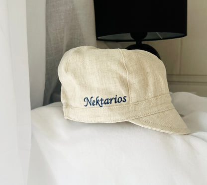 Beige linen paper boy cap for baptisms and christenings with optional embroidery