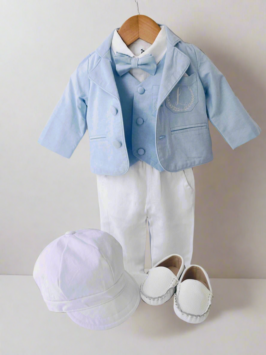 Light blue and white suit set with blue vest, bow tie and jacket, white linen pants, suspenders and shirt