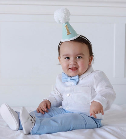 Blue chambray set with blue pants, white linen shirt, white, blue or beige suspenders and blue bow tie