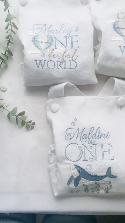 Boys White Linen first birthday romper with custom embroidery designs